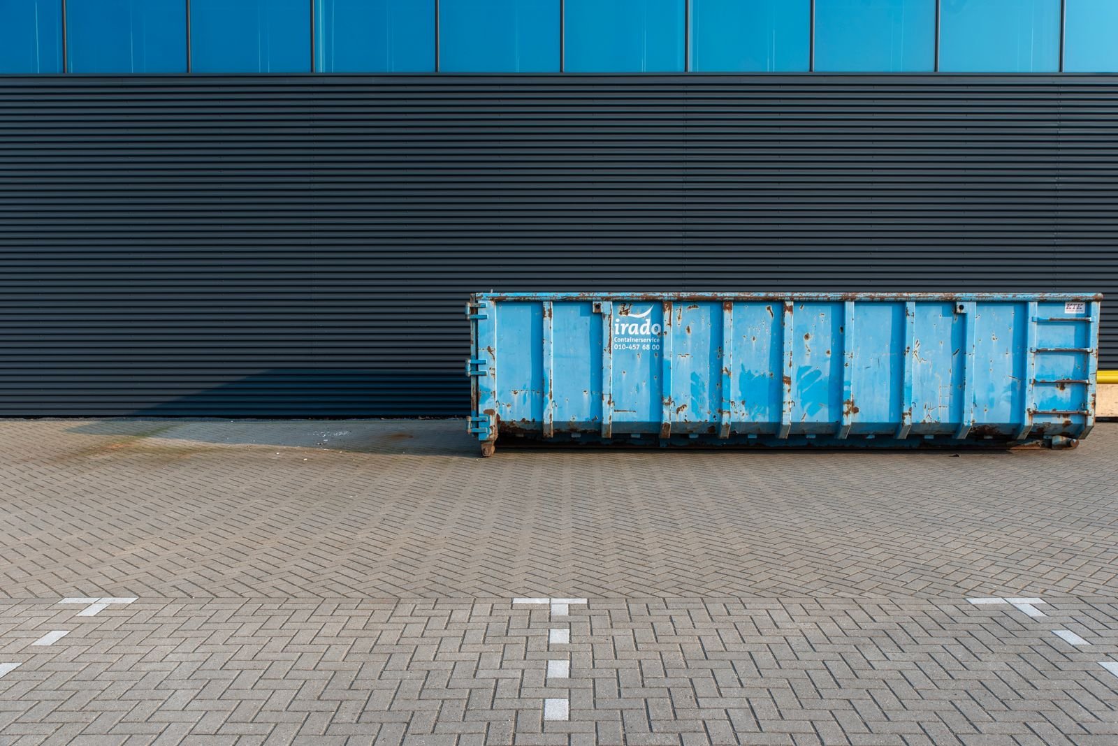 Roll-off dumpster at a job site